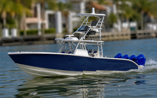 TMRC 42 Offshore — navy-hulled 3D printed RC center console with quad outboards running on the water